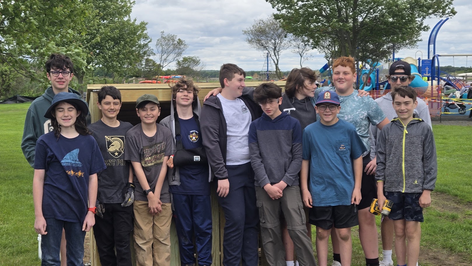 Troop members standing together after a service project.